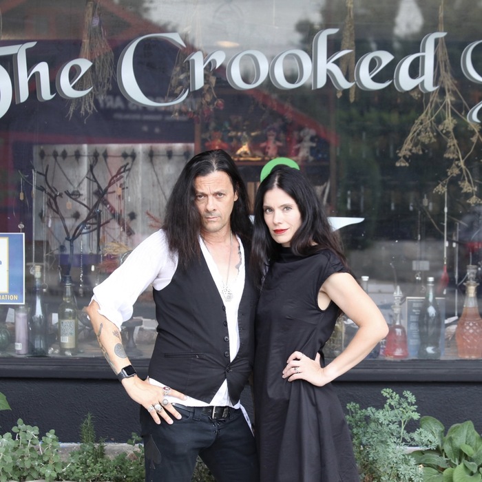 Sal Santoro and Popi Mavros of The Crooked Path in front of the shop